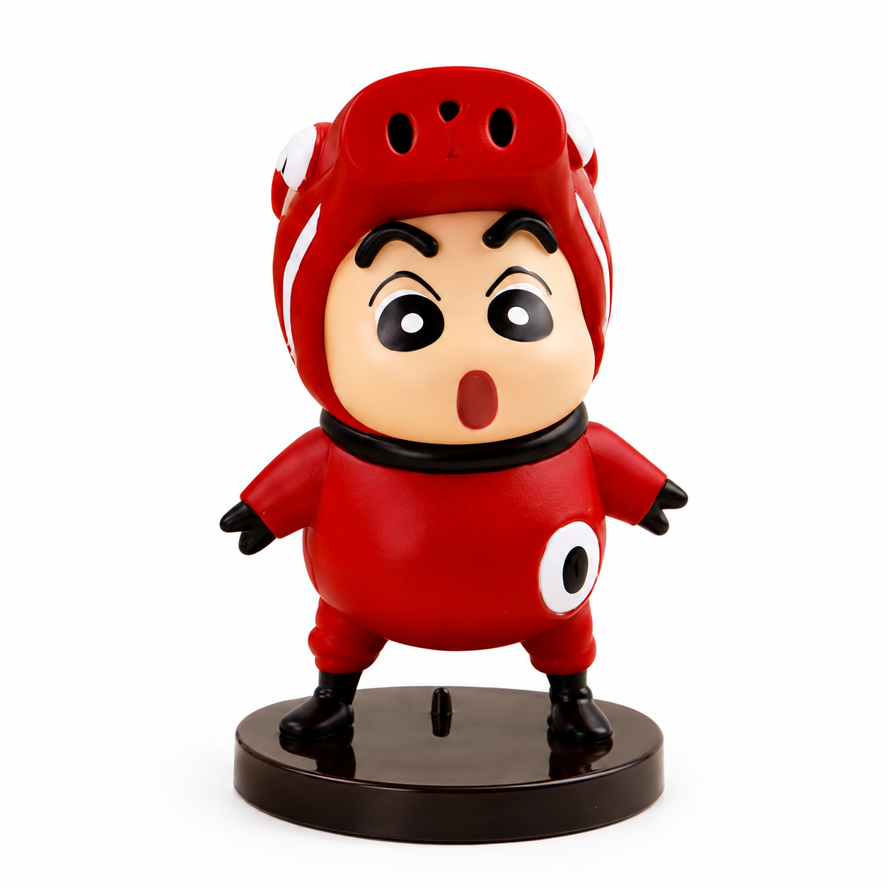 Toy figure in a red outfit with a surprised expression on a white background
